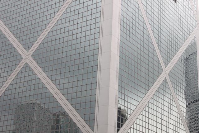 Bank of China Tower glass facade with geometric cross-bracing reflections