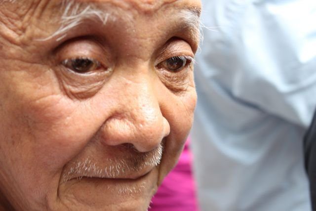 Close-up portrait of an elderly person in Hong Kong