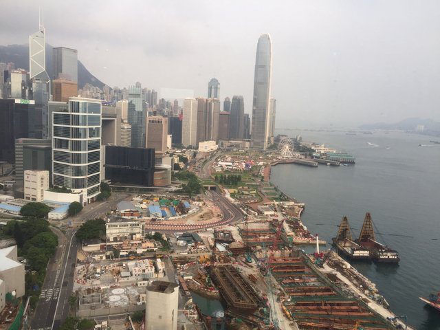 Aerial view of Hong Kong Island waterfront with construction and skyscrapers