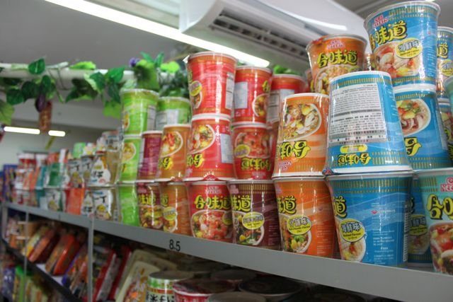 Cup Noodles stacked on shelves in a Hong Kong convenience store