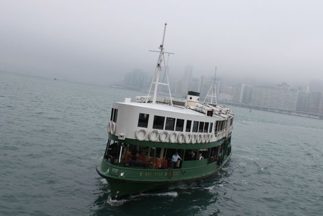 Star Ferry Day Star vessel crossing the harbour on an overcast day