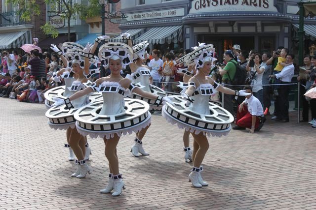 Dancers in film reel costumes performing in the Disneyland parade
